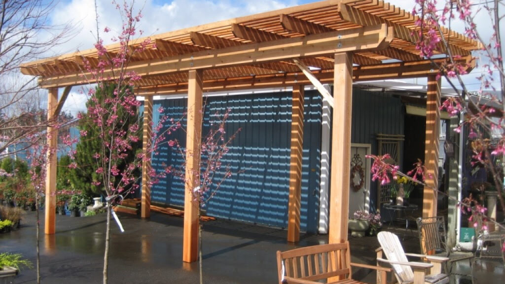 a wooden pergola on a patio