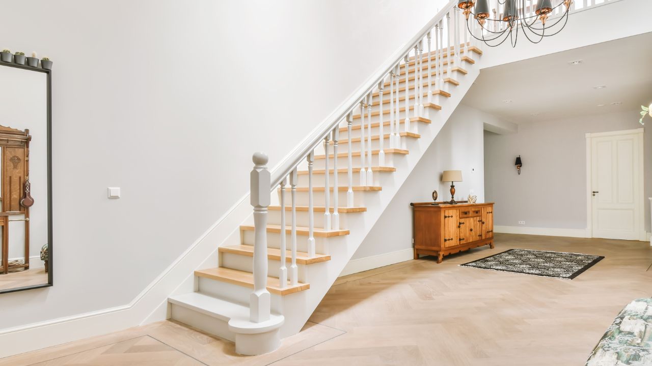 white residential staircase improved by replacement