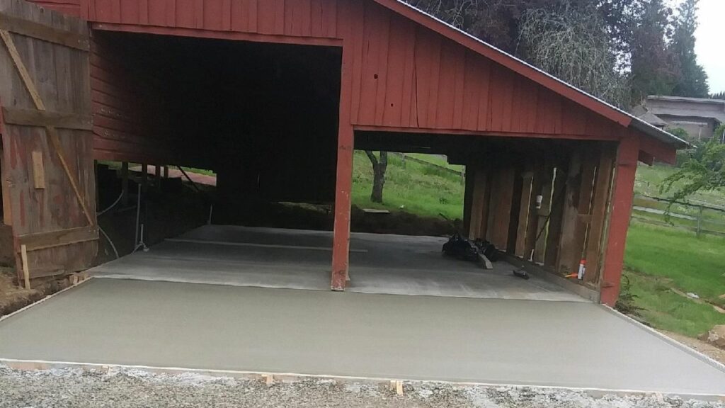 laying foundation outside barn