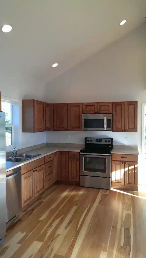 Completed kitchen with wood cabinets and stainless appliances in Hillsboro, Oregon