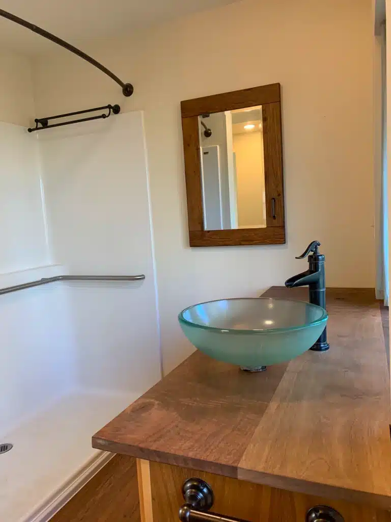 Bathroom with vessel sink and walk-in shower in McMinnville
