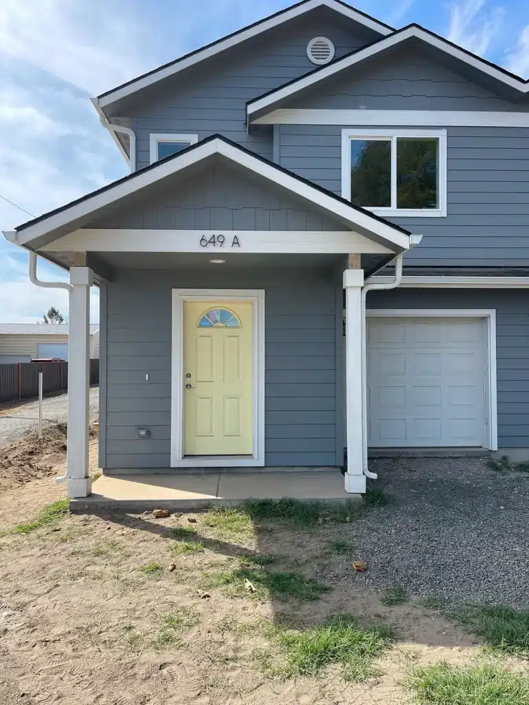 Front exterior of duplex unit 649A during construction