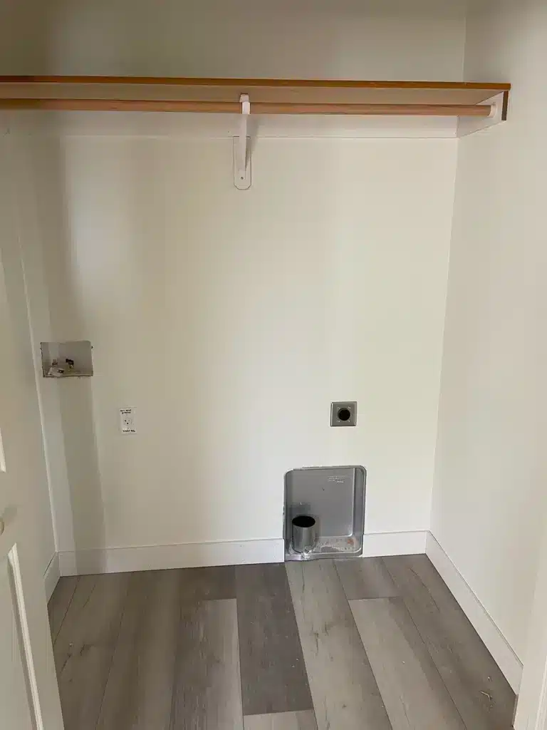 Laundry room setup with hookups in new duplex