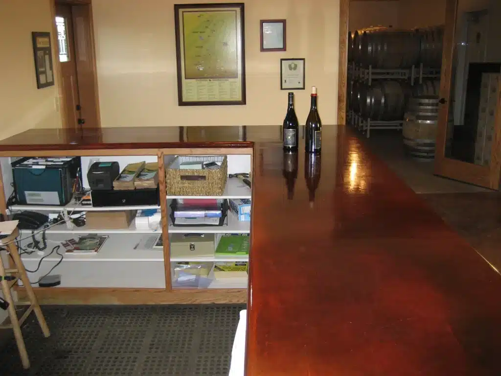 Backside of tasting bar with shelving in Newberg build-out