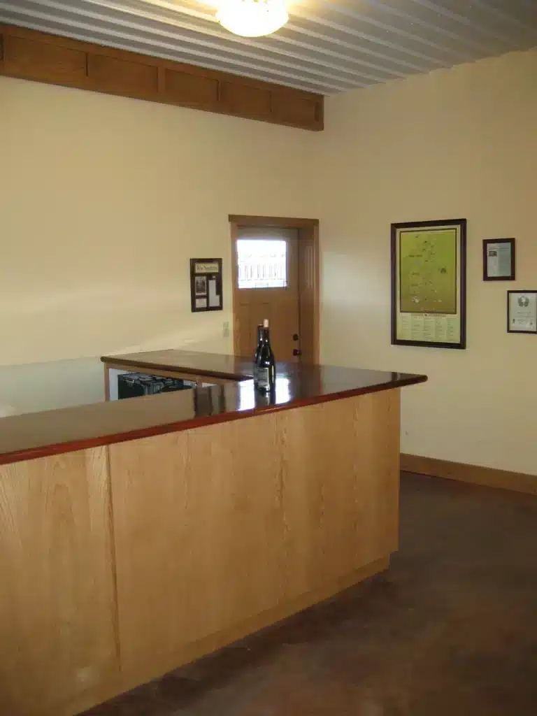 Bar area with framed doorway in renovated Newberg tasting room