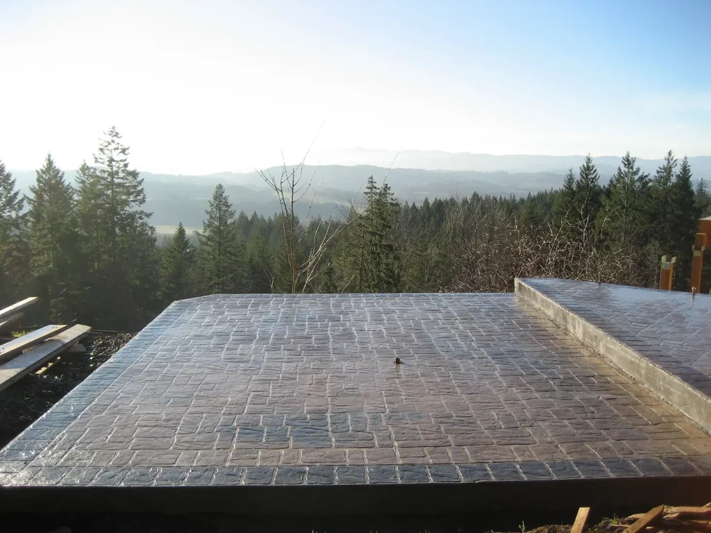 Stamped concrete patio overlooking scenic landscape