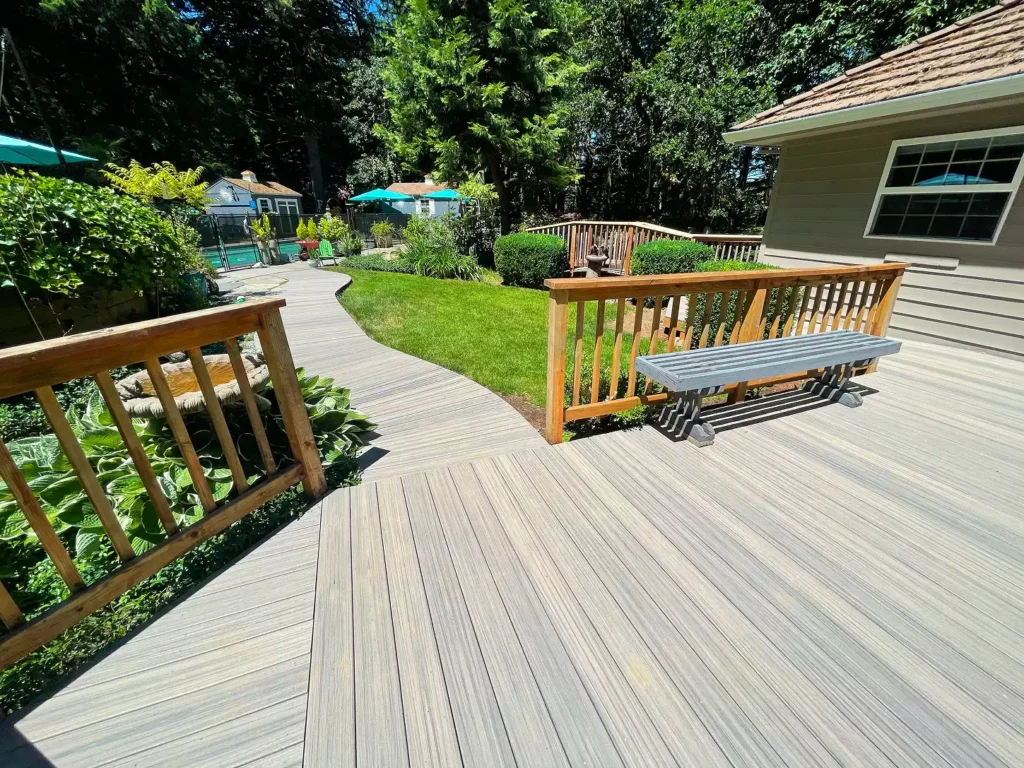 Composite deck surface with railing and garden path in Sherwood, Oregon