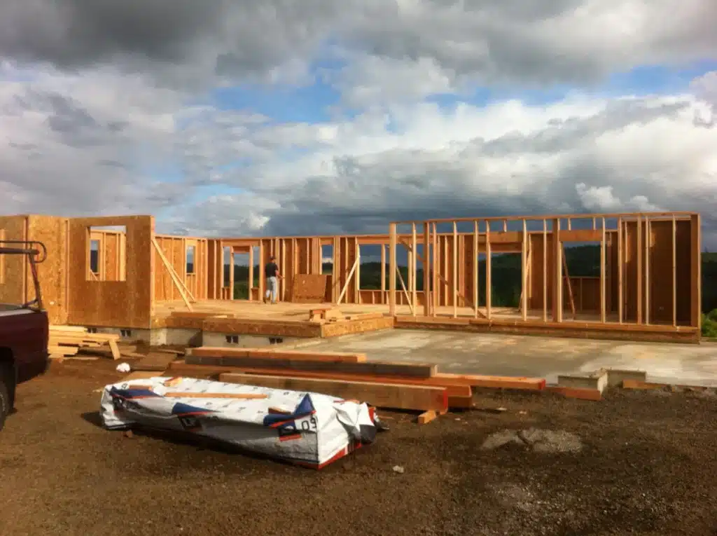 Exterior wall framing and structural layout underway for a custom home in Hillsboro, Oregon