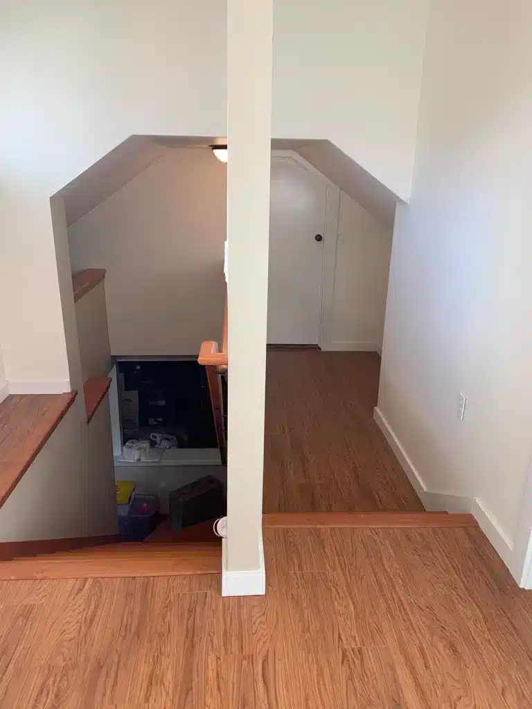 Stair landing with new flooring in McMinnville