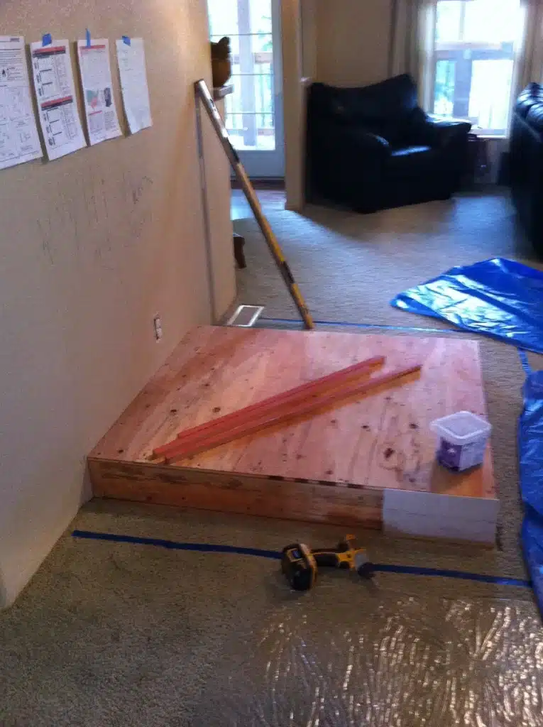 Initial framing and material layout for wood stove hearth construction