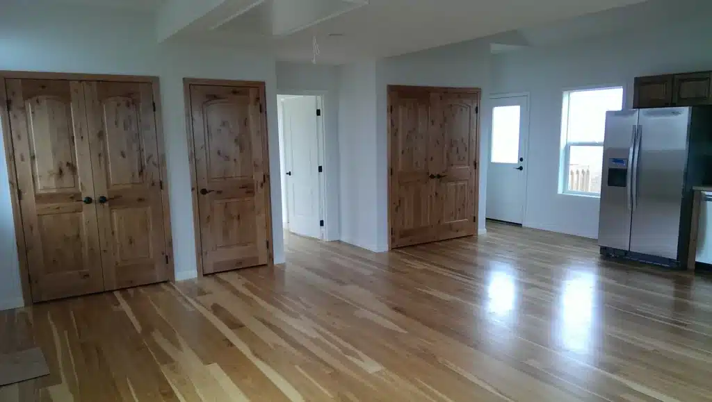 Finished hardwood floors and knotty wood doors in Hillsboro, Oregon